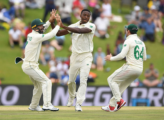 Kagiso Rabada Celebrating a wicket with Megapro on digital screens in the background